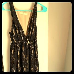 Black lace and cream cocktail dress